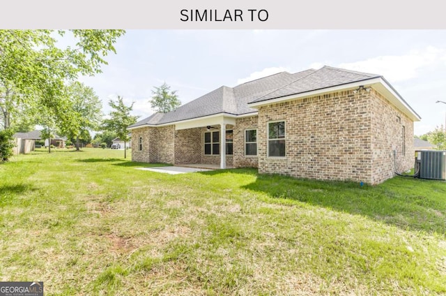 107 Tilden Way, Perry, GA 31069 - back of house with a patio, central AC unit, ceiling fan, and a lawn