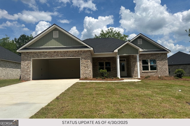 107 Tilden Way, Perry, GA 31069 - craftsman-style house with brick siding, concrete driveway, an attached garage, a front lawn, and board and batten siding