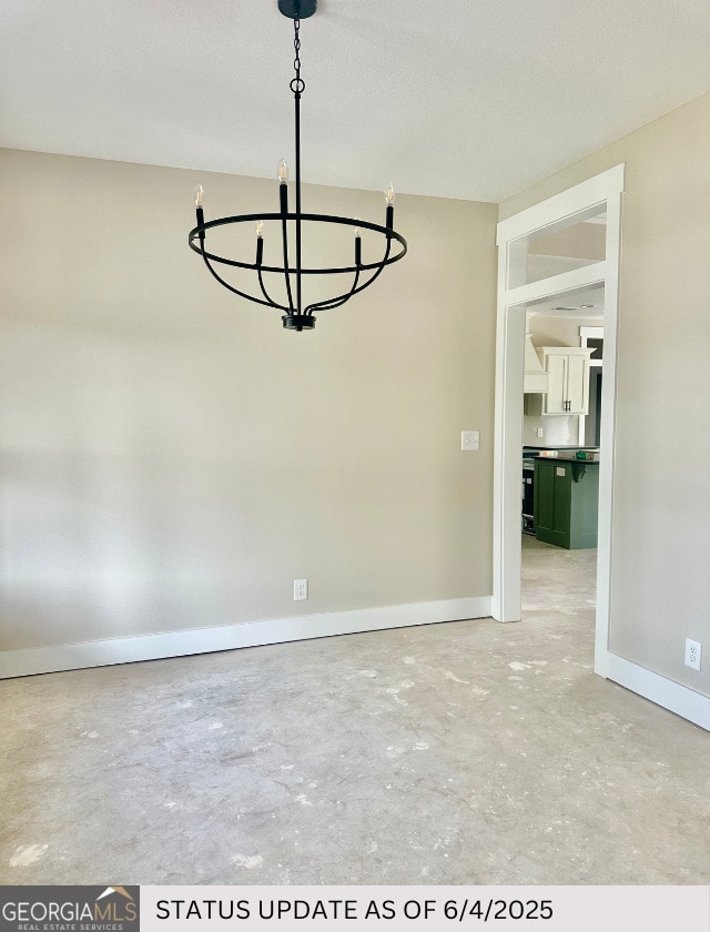 107 Tilden Way, Perry, GA 31069 - unfurnished dining area featuring a chandelier and concrete flooring