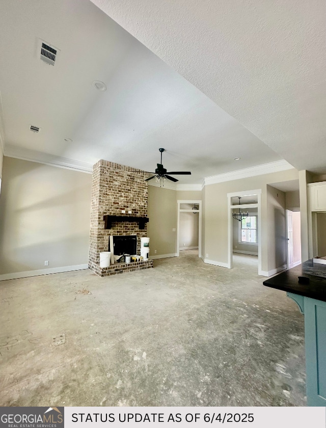 107 Tilden Way, Perry, GA 31069 - unfurnished living room featuring crown molding, a brick fireplace, and ceiling fan