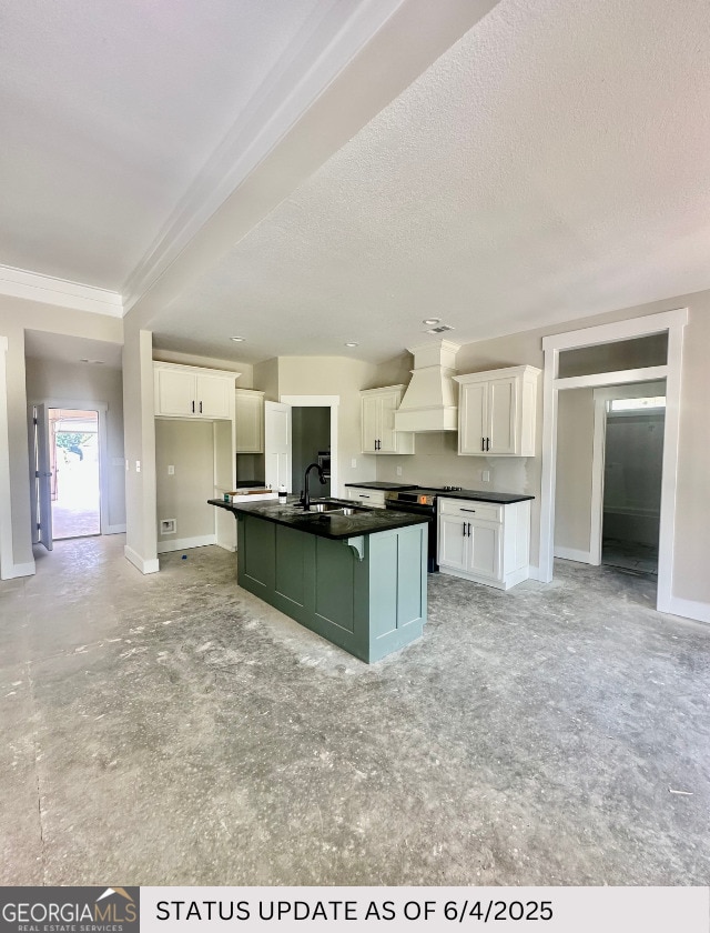 107 Tilden Way, Perry, GA 31069 - kitchen with custom range hood, dark countertops, white cabinetry, stainless steel electric range oven, and ornamental molding