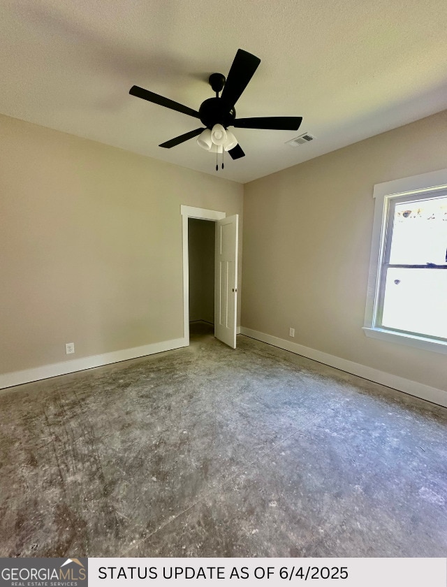 107 Tilden Way, Perry, GA 31069 - unfurnished bedroom featuring baseboards and a ceiling fan