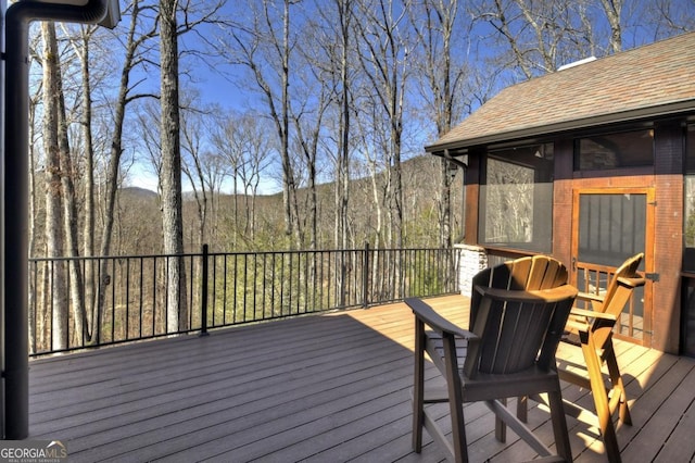 deck with a view of trees