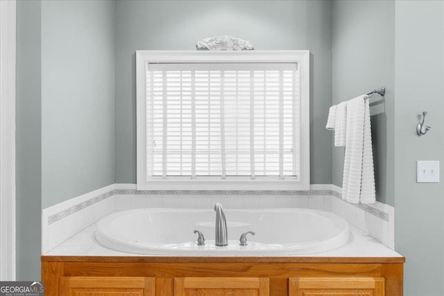 bathroom featuring a bath