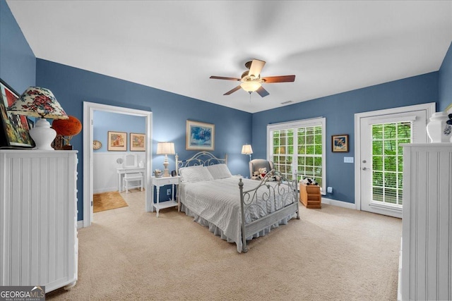 bedroom with carpet floors, baseboards, access to exterior, and ceiling fan