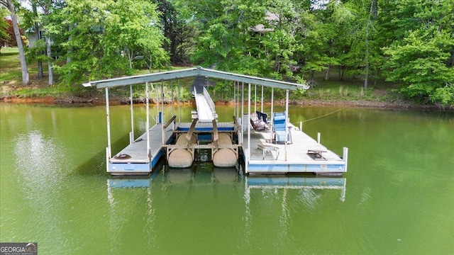 dock area featuring a water view and boat lift