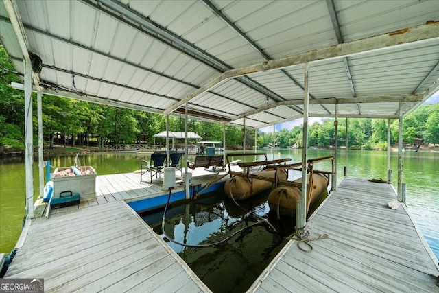 view of dock with a water view