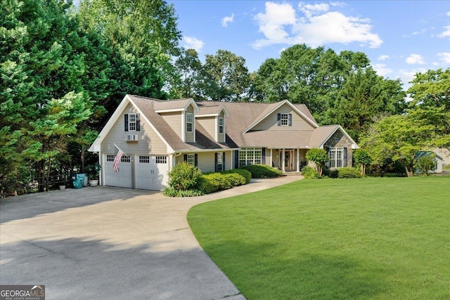cape cod-style house with driveway, a front yard, and a garage