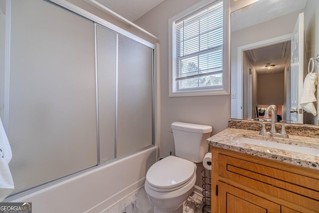 785 Josh Ln, Lawrenceville, GA 30045 - bathroom featuring toilet, vanity, and enclosed tub / shower combo