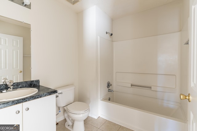 bathroom featuring shower / bathing tub combination, toilet, tile patterned flooring, and vanity