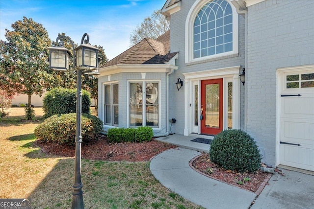 2445 Ridgelake Dr, Villa Rica, GA 30180 - entrance to property featuring brick siding and a lawn