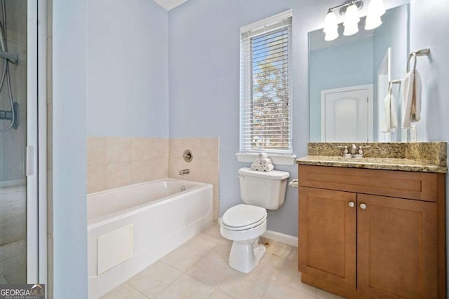 bathroom with a shower, toilet, vanity, a garden tub, and tile patterned flooring