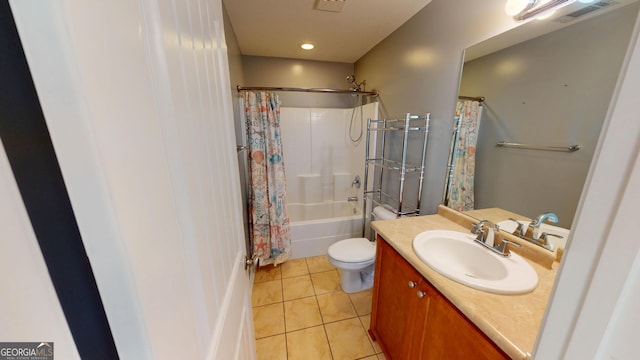 full bathroom with tile patterned flooring, vanity, toilet, shower / tub combo, and visible vents