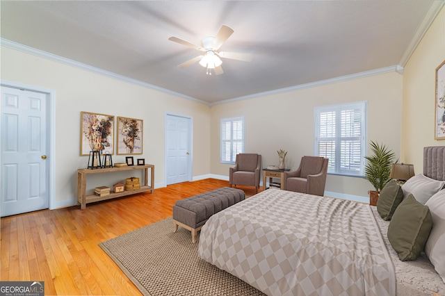 1631 Moody Holw, Hiawassee, GA 30546 - bedroom with crown molding, baseboards, light wood-style floors, and a ceiling fan