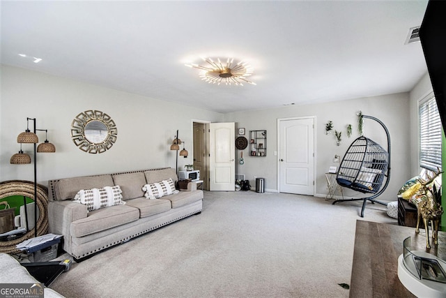 carpeted living room featuring visible vents