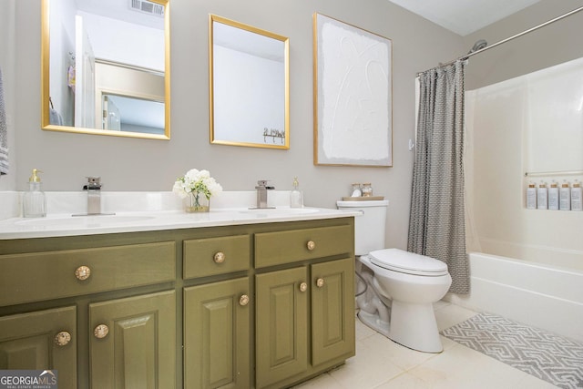 bathroom with double vanity, a sink, shower / bath combination with curtain, and toilet