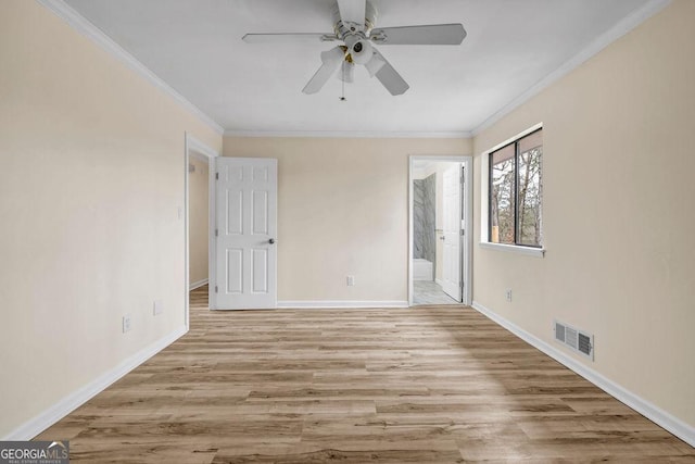 8443 Park Ridge Ln, Riverdale, GA 30274 - empty room with crown molding, baseboards, visible vents, a ceiling fan, and wood finished floors