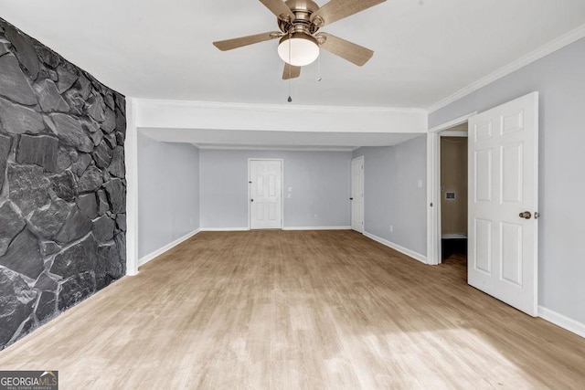 8443 Park Ridge Ln, Riverdale, GA 30274 - spare room with ornamental molding, baseboards, ceiling fan, and wood finished floors