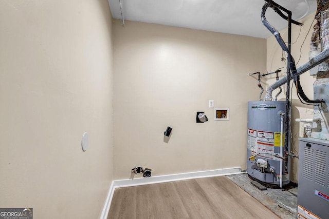 8443 Park Ridge Ln, Riverdale, GA 30274 - utility room featuring gas water heater