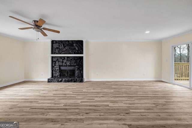 8443 Park Ridge Ln, Riverdale, GA 30274 - unfurnished living room featuring baseboards, ornamental molding, wood finished floors, and a ceiling fan