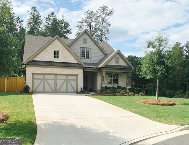 5745 Pickens Garden Ln, Powder Springs, GA 30127 - craftsman inspired home featuring brick siding, concrete driveway, a garage, and roof with shingles