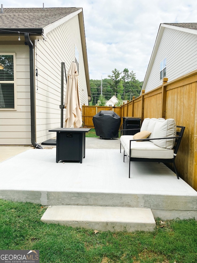 5745 Pickens Garden Ln, Powder Springs, GA 30127 - view of patio featuring grilling area and a fire pit