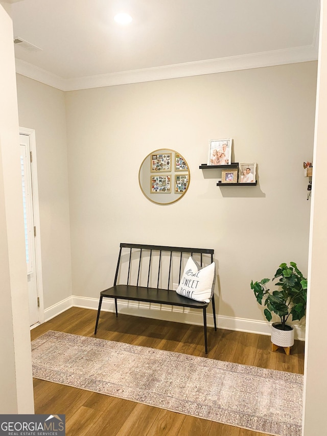 5745 Pickens Garden Ln, Powder Springs, GA 30127 - living area with ornamental molding, wood finished floors, and recessed lighting