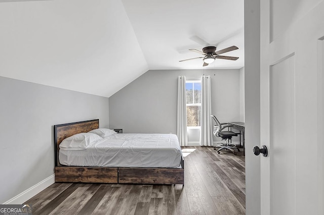 58 Estate Dr, Dahlonega, GA 30533 - bedroom with wood finished floors, vaulted ceiling, baseboards, a desk, and ceiling fan