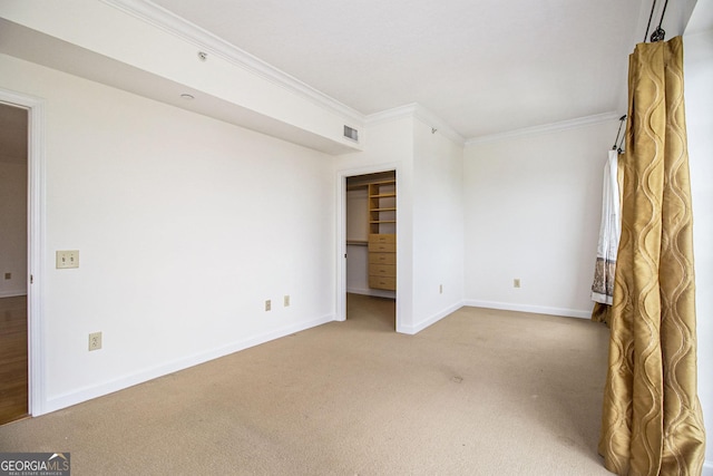 195 14th St NE Ph 306, Atlanta, GA 30309 - unfurnished room with crown molding, light colored carpet, and baseboards