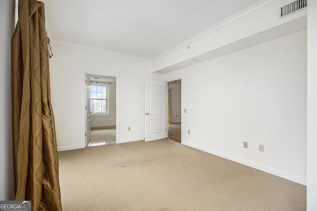 195 14th St NE Ph 306, Atlanta, GA 30309 - carpeted empty room with ornamental molding and baseboards