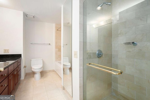 195 14th St NE Ph 306, Atlanta, GA 30309 - full bathroom featuring toilet, vanity, and tile patterned flooring