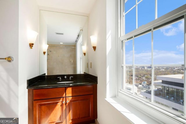 195 14th St NE Ph 306, Atlanta, GA 30309 - bathroom with a shower and vanity