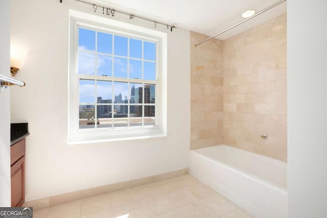 195 14th St NE Ph 306, Atlanta, GA 30309 - full bathroom featuring baseboards, shower / bathtub combination, vanity, and plenty of natural light