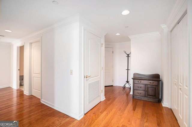 195 14th St NE Ph 306, Atlanta, GA 30309 - hall featuring recessed lighting, light wood-style flooring, ornamental molding, and baseboards