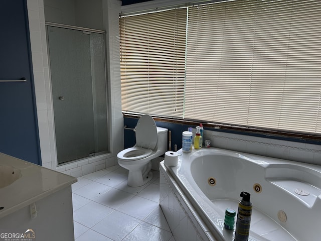 78 Ramblin Rose Ln, Rabun Gap, GA 30568 - full bathroom featuring toilet, a shower stall, a tub with jets, tile patterned flooring, and a sink