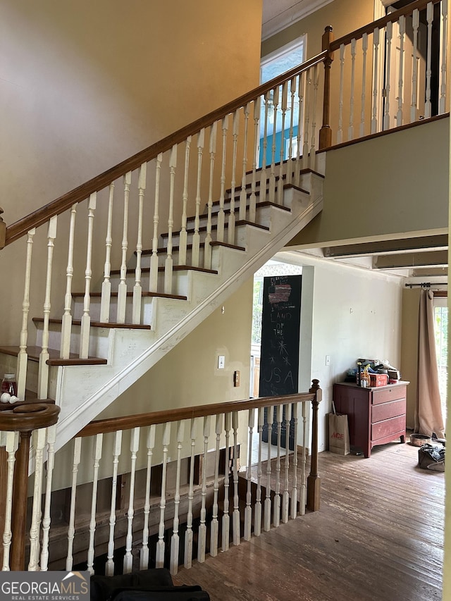78 Ramblin Rose Ln, Rabun Gap, GA 30568 - stairs with wood finished floors and a high ceiling