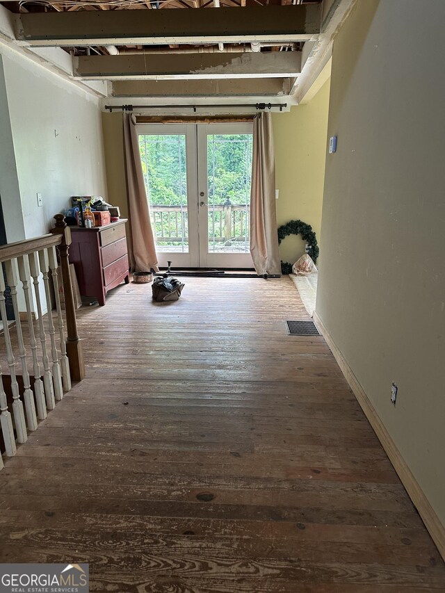 78 Ramblin Rose Ln, Rabun Gap, GA 30568 - unfurnished room featuring french doors and hardwood / wood-style floors