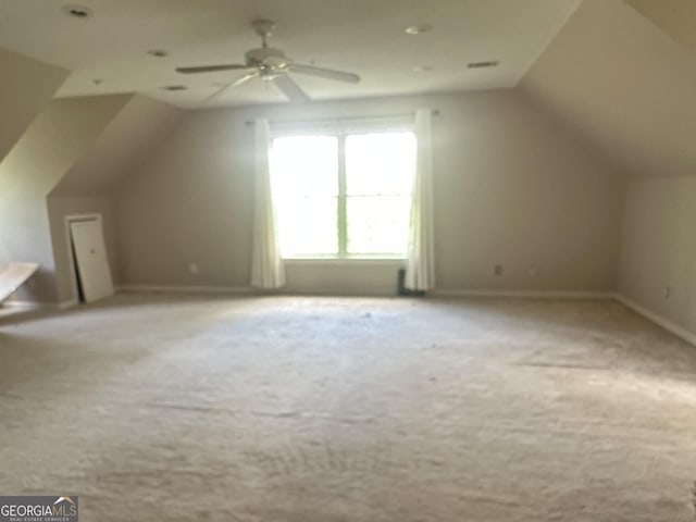 78 Ramblin Rose Ln, Rabun Gap, GA 30568 - additional living space with lofted ceiling, carpet flooring, ceiling fan, and baseboards