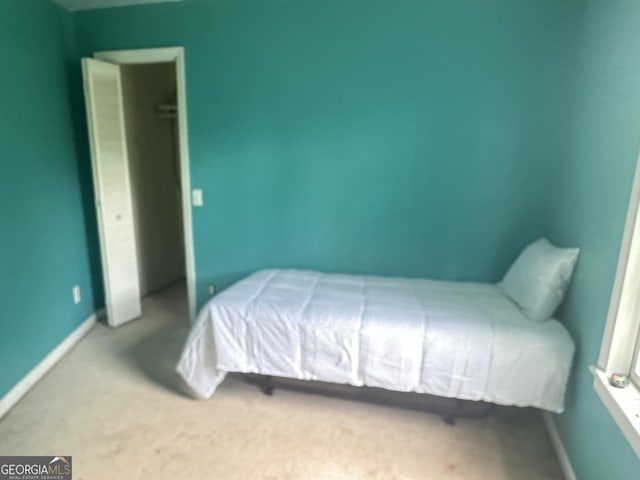 78 Ramblin Rose Ln, Rabun Gap, GA 30568 - carpeted bedroom featuring baseboards