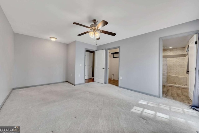 2285 Bascomb Carmel Rd, Woodstock, GA 30189 - unfurnished bedroom with carpet, a ceiling fan, and ensuite bathroom