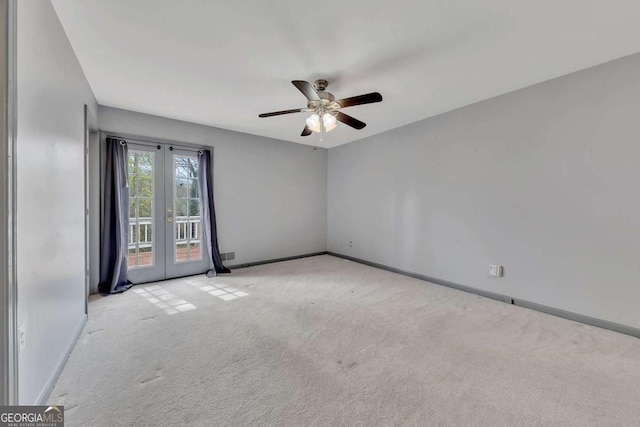 2285 Bascomb Carmel Rd, Woodstock, GA 30189 - carpeted spare room featuring french doors and a ceiling fan