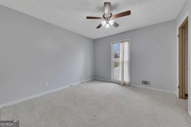 2285 Bascomb Carmel Rd, Woodstock, GA 30189 - unfurnished room with carpet flooring, a textured ceiling, and a ceiling fan