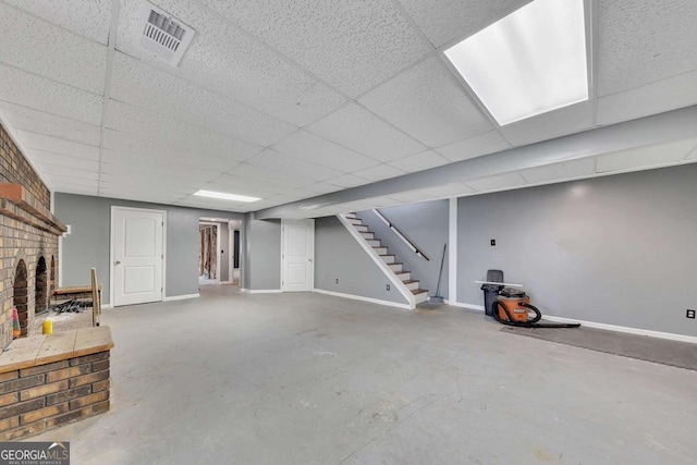 2285 Bascomb Carmel Rd, Woodstock, GA 30189 - basement with stairs, a drop ceiling, and a fireplace
