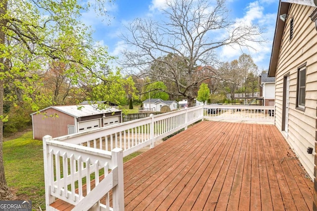 2285 Bascomb Carmel Rd, Woodstock, GA 30189 - wooden deck with an outdoor structure