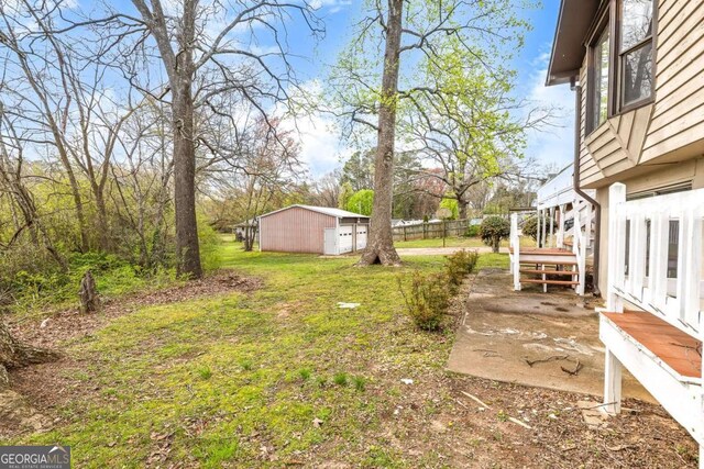 2285 Bascomb Carmel Rd, Woodstock, GA 30189 - view of yard with an outbuilding
