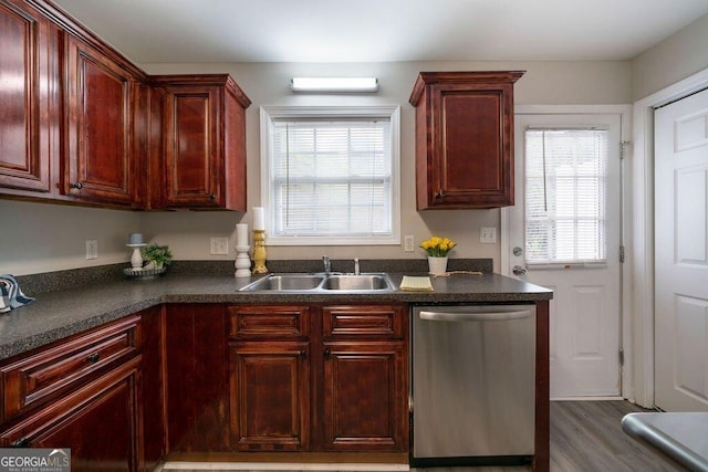413 W I Pkwy, Dallas, GA 30132 - kitchen featuring dark countertops, a sink, dark brown cabinets, and stainless steel dishwasher