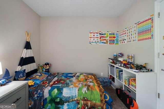 413 W I Pkwy, Dallas, GA 30132 - carpeted bedroom featuring a textured ceiling