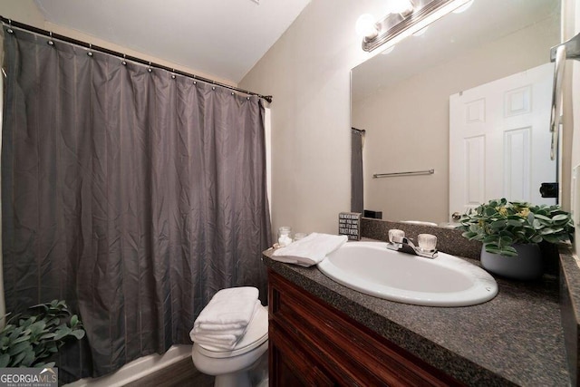 413 W I Pkwy, Dallas, GA 30132 - full bathroom featuring toilet, vanity, and a shower with curtain