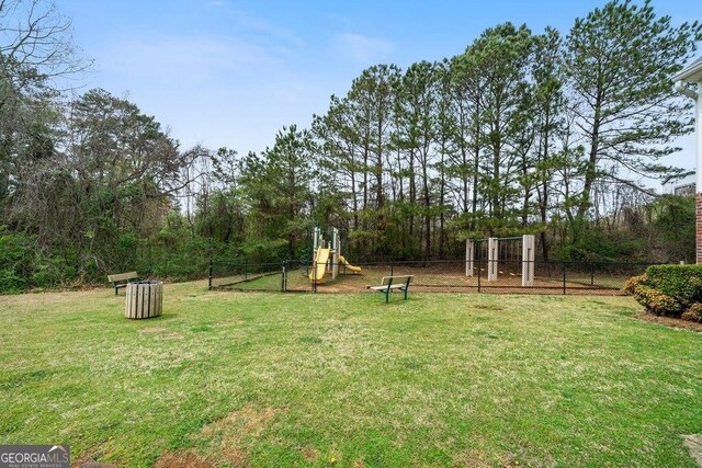 413 W I Pkwy, Dallas, GA 30132 - view of yard featuring playground community and fence