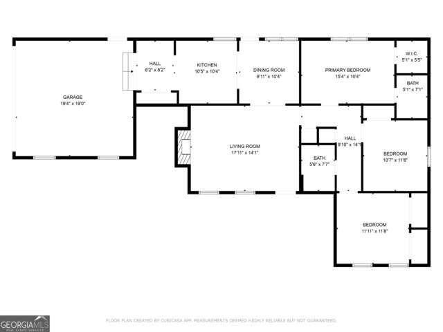 foyer featuring light wood finished floors, wooden walls, high vaulted ceiling, a ceiling fan, and baseboards